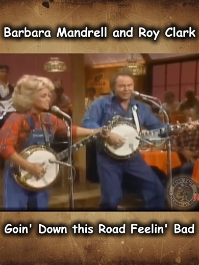 Barbara Mandrell and Roy Clark delivered a high-energy, technical performance of the traditional folk song "Goin' Down This Road Feelin' Bad," notably featured on Hee Haw around 1980. The duo showcased their instrumental virtuosity, particularly on the banjo, turning the traditional blues tune into a fast-paced country showcase. #countrymusic #bringbackolecountrymusic | Bring Back Ole Country Music
