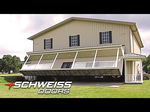 Hangar Home Porch with a Unique Schweiss Hydraulic Garage Door Hidden