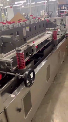 Bag making standing pouch machine