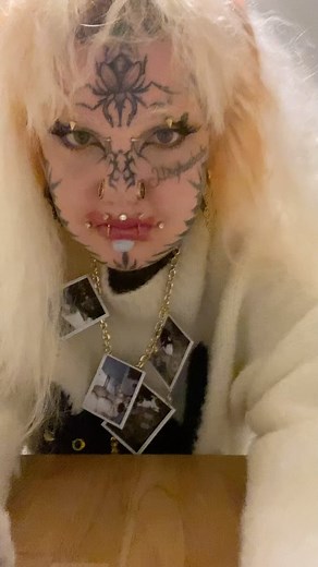 Nea Kyllikki on Instagram: "Guess what I am for halloween (Clue: the look is completed with a necklace that I made with pics of our cats) 🐈‍⬛"