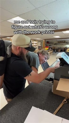 Me And Twin Trying To Figure Out What's Wrong With The Work Printer...