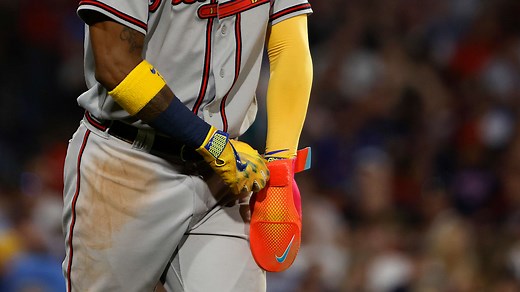 Why do MLB players wear oven mitts?