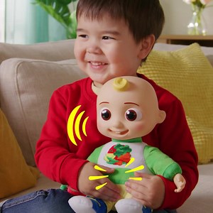 Grab a treat and get ready to eat with the CoComelon Snack Time JJ plush doll! Learn to eat your fruits and veggies with JJ, as he plays fun sounds and phrases including the "Yes Yes Vegetables Song". Your child will love singing as they snack along. Available Now at Big W, Toyworld, Mr Toys and more. | CoComelon
