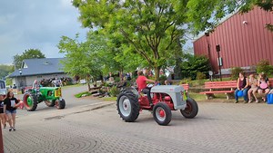 The parade of tractors by the Antique Tractor Association. | Sussex County Fairgrounds
