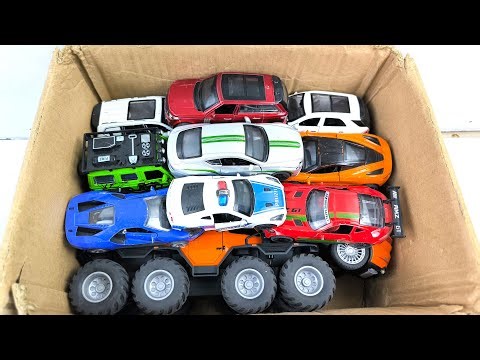Box Full of Model Cars -Mazda Mx5, Koenigesgg Jesko, Lamborghini Scv12, Byd Yang Wang U8, Toyota Car