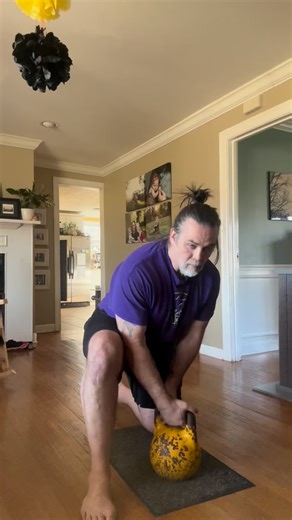 Half kneeling bent press. Excellent for shoulder and thoracic spine mobility. A very valuable progression that bridge is the gap between the get up and the standing vent press. #KettleBell #KettlebellCoach #Irontamer #BentPress | Dave Whitley