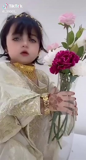 Traditional Ceremony Outfit and Flower Arrangement