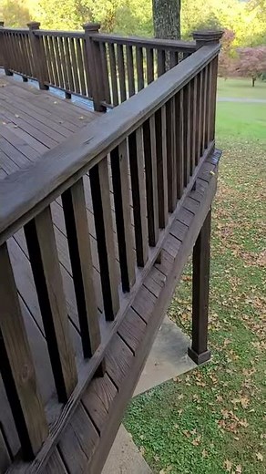Deck sprayed and backbrushed with Cabot Semi-solid stain.
