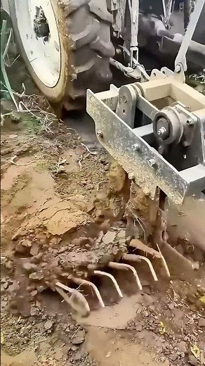 Tractor with Rototiller Attachment: Trenching and Fertilizing in One!