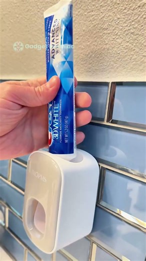 Wall mounted toothpaste dispenser