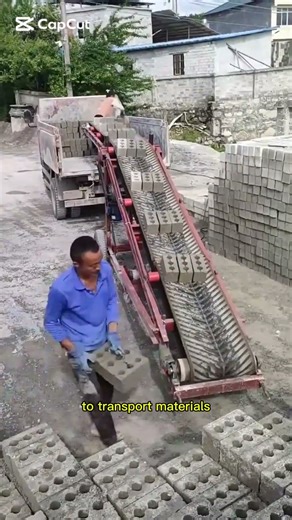 From Ground to Truck: Seamless Concrete Block Movement with a ConveyorConstructionLife#MaterialHandl