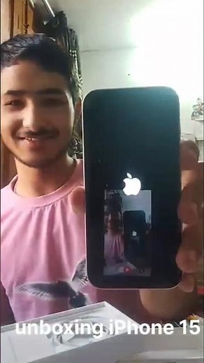 unboxing new iPhone 15 .