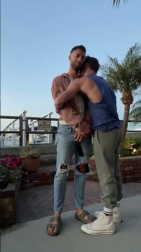 Affectionate Embrace Between Two Men on Rooftop Setting#GayLove #GayCoupleGoals