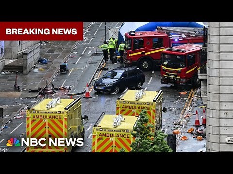 Driver detained after car drives into crowd at Liverpool parade