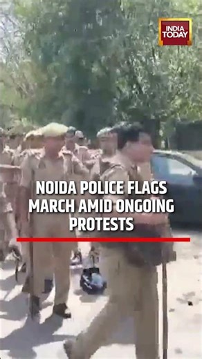 Noida Protest: Noida Police Conduct Flag March in Sector 121 Amid Workers’ Wage Protest #noida