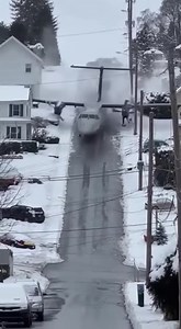 Small Aircraft Slides Down Snowy Hill Through Residential Neighborhood ✈️❄️ Juneau, Alaska — Sunday, March 23, 2025 Smartphone footage shows a small plane crashing onto a steep residential hill during active snowfall. The aircraft skids down the icy street past homes and parked vehicles, sending snow and debris spraying outward before finally coming to rest near the bottom of the slope. Emergency crews responded quickly to secure the area and assist those involved. No life-threatening injuries w