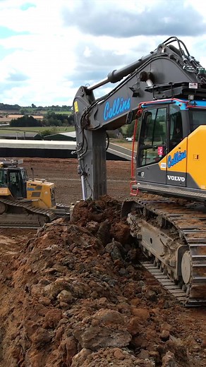 Two of our Volvo EC750E #excavators loading in a staggered formation on a bench. Both 750s have the blue and white chevrons with Collins logo on the counterweight that are a feature on our most recent machines. #collinsearthworks #volvoce #earthmoving #excavator #bulldozer #construction