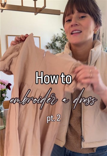 Part 2: embroidering the dress 🥰 I don’t use a hoop and I stitch through all 3 layers: iron-on stabilizer, dress fabric, and sticker pattern paper. Let me know what other questions you have and anything you want me to address in the final part of this video tomorrow Want to stitch with me? Grab the pattern “LITTLE DAISIES” in my shop linked in my bio