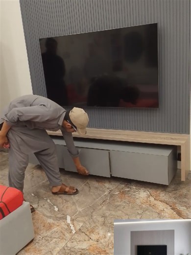 Laminated Media Wall Design by Ahmad Woodworks