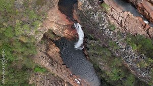 aerial video of waterfall at Chapada dos Veadeiros, Complexo do Macaco, Catedral Waterfall, Goias, Brazil, beautiful, sunny day, summer, travel destination