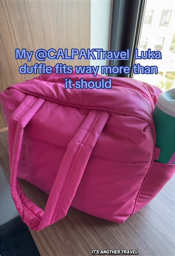 Everything I can fit in my @CALPAK Travel Luka duffle for a travel day ✈️ I love a bag that actually holds everything I need without feeling bulky. From tech to skincare to random “just in case” items… it all fits. This one has been coming with me on every trip lately. Also obsessed with this @Owala birthday bash cup lately 👀 #calpak #Travelbag #whatsinmybag #travelessentials #traveltok
