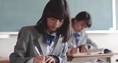 Japanese schoolgirls studying in the classroom