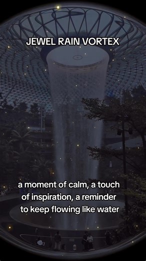 ✨ Jewel Rain Vortex – Where Nature Meets Wonder At the heart of Changi Airport, the sky opens and water falls like magic. The Jewel Rain Vortex, the world’s tallest indoor waterfall - flows through light and mist, turning the air into a dream. Surrounded by a lush green forest, it’s where nature and design meet — calm, beauty, and inspiration in one breathtaking moment. When night falls, the waterfall glows with color and music, filling the air with wonder. Each drop reminds us that peace and be