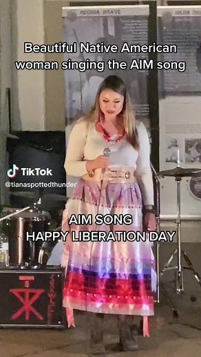 Empowering Ojibwe Women: Beautiful Native American Woman Singing AIM Song