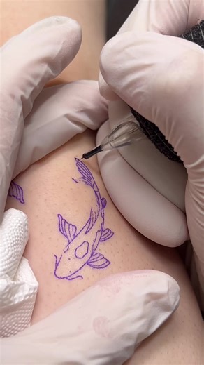 Koi Fish Tattoo Process: Artist's Precise Technique