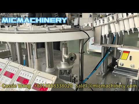 MIC Automatic Plastic syringe Loading Filling Capping Machine Testing Video