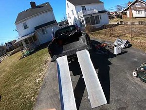 how to load a commercial mower onto a pick up truck