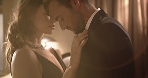 clip-1050478033-elegant-couple-dancing-sensually-party-loving-young