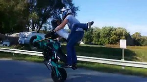 Reverse Piggyback Tandem Wheelie