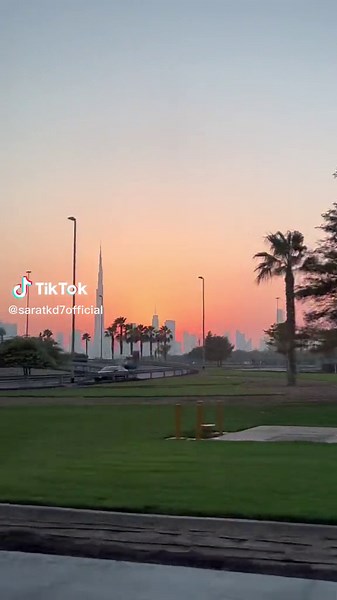 Stunning Sunset Over Dubai's Skyscrapers and Parks