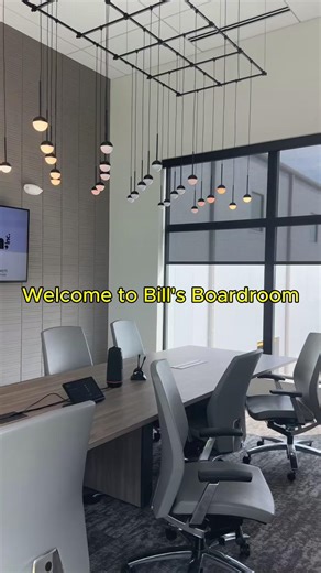Welcome to Bill’s Boardroom — a space that blends legacy with standout design. This second-floor conference room overlooks our new Green Bay showroom and is dedicated to Bill Calawerts, John’s father, who purchased VerHalen in 1980. With a stunning 32-pendant chandelier making the statement, who needs wall art? A room built for big ideas, meaningful conversations, and honoring where we came from. | Pella Windows & Doors of Wisconsin