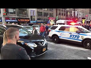 NYPD MAKING A DRAMATIC TRAFFIC STOP ON WEST 39TH ST. IN HELL'S KITCHEN, MANHATTAN, NEW YORK.