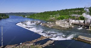 The Willamette Falls is a horseshoe-shaped block waterfall caused by a basalt shelf in the river bottom. The 42-foot-high and 1,500-foot-wide falls is located in Oregon City Oregon