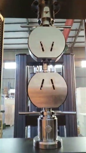 Universal testing machine with microcomputer control