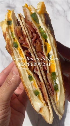 Cheesy Bacon Jalapeño Popper wrap | my favorite appetizer using the tortilla wrap hack. Perfect little snack or appetizer👏🏼 •mozzarella •cheddar •crumbled bacon •grilled jalapeños •cream cheese •burrito sized tortilla #tortillawrap #easyrecipes #snackideas #easysnack #appetizers #appetizerideas #quickrecipes #easyappetizers #jalapenopoppers | Sheila Williams