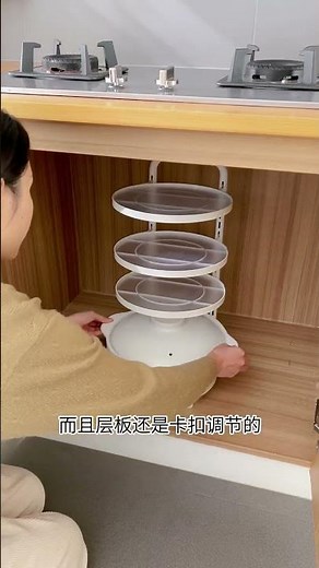 A modern modular kitchen with intelligently planned cabinets, pull-out drawers, and hidden storage t