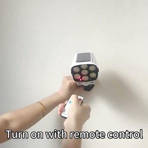 Solar-Powered 77 LED Motion Sensor Waterproof Security Light, Dummy Camera,