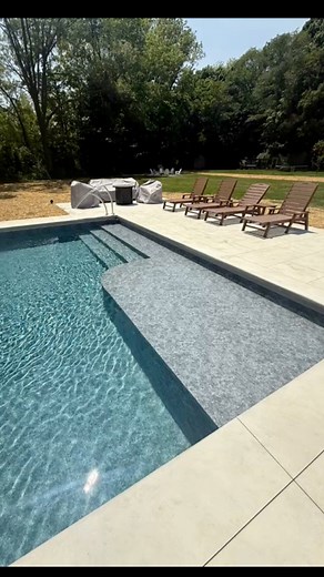 1.6K views · 30 reactions | Another beautiful pool wrapped up this week in Noblesville! We love the half ledge and half step combo on this 20x40 beauty. The Merlin Island Granite liner gives this pool a timeless look. We also added three crown jet fountains which are always fantastic additions. This pool is ready for summer! | C Ray Pools | Facebook