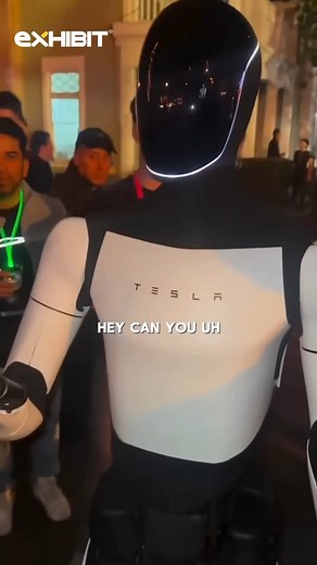 3.7K views · 54 reactions | The Tesla Bot can talk! It’s a 5’8” humanoid that runs on the same AI as the Tesla’s fleet of autonomous vehicles. This includes a complex system of cameras and other devices that help the robot operate in real world scenarios. Incredible to see how far the technology has come and what 2025 unfolds for us! #robot #teslarobot #teslamotors #teslaclub #ai | Exhibit Magazine | Facebook