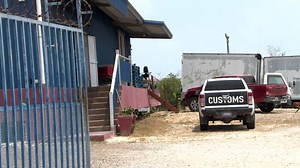 Customs confiscates hundreds of cases of suspect liquor Tonight the Customs Department is deep into the interior of the Victor L Bryant Warehouse in Belize City. They’re looking for bottles of top shelf liquor with fake “Belize Market” labels. These are the labels that are required by law to be attached to every bottle of imported whiskey, tequila, gin, liquor, imported rum, vodka, brandy, cognac and bitters. The sticker is designed with a hologram and brilliant colors so it is difficult to forg