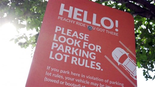 Atlanta's rise in car booting prompts masked women to take matters into their own hands