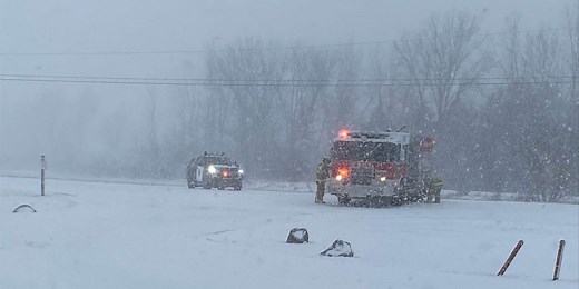 Police: Train strikes car stuck on tracks, another car catches on fire