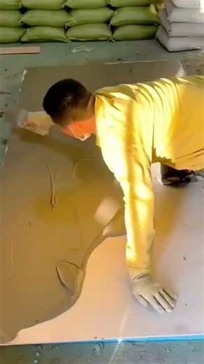 Sanding large wooden tabletop surface for smooth finishing