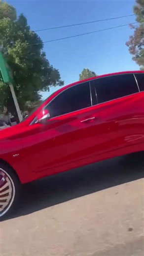 Red Infiniti Q50 on 28’s DUB Floaters Ridin