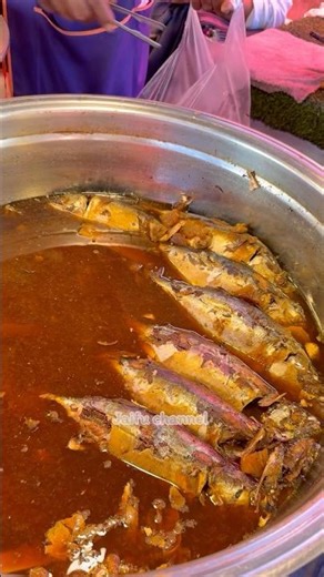 Salted boiled mackerel, 50 baht each. Available only on Saturdays and Sundays at P'Ya's market, w...