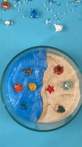 40K views · 297 reactions | Dive into sensory play with this beach-themed slime activity that brings the shore to your fingertips. From the gritty texture of sand slime to the shimmering swirl of ocean water slime, it’s a seaside escape in every stretch and squish. ️✨ #CrayolaSlime #BeachGames #SensoryPlay | Crayola | Facebook